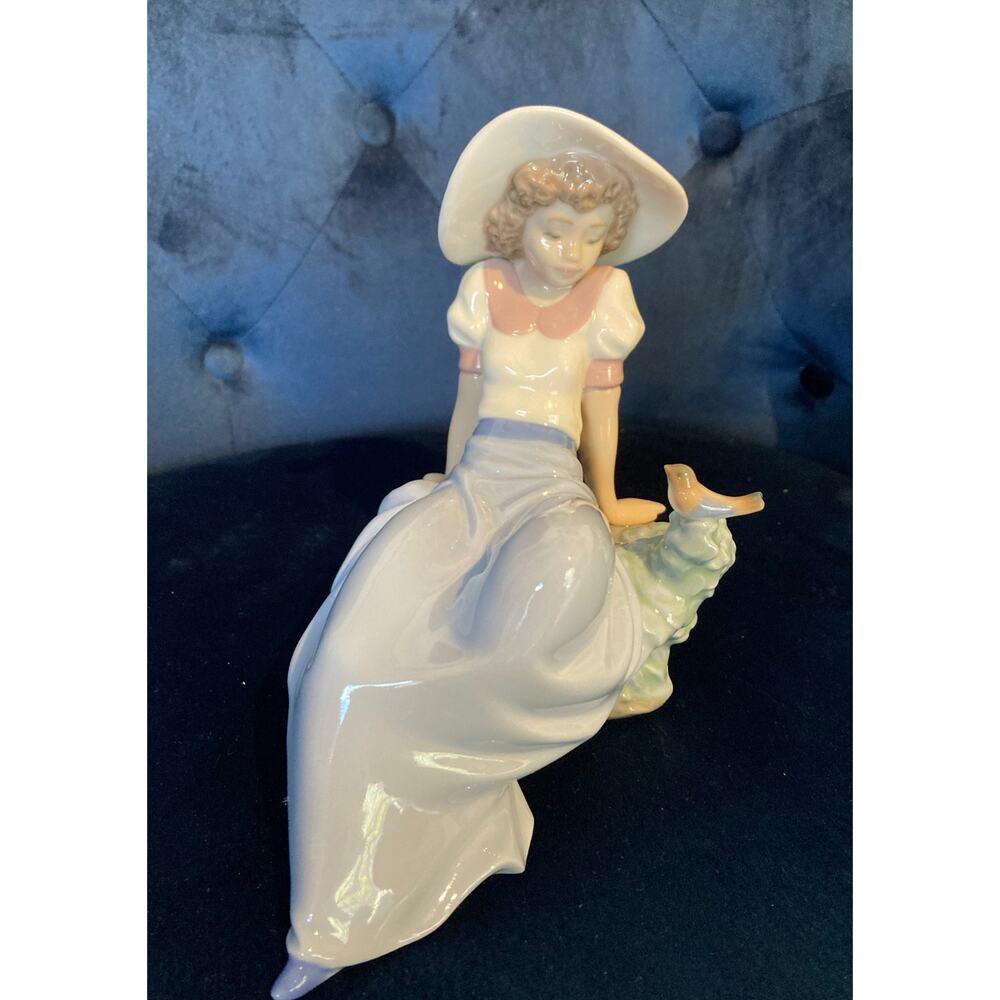 NAO by Lladro “Girl with Bird” Figurine #01042 –1987 With Box – Excellent item.